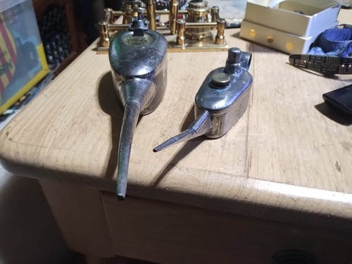 Two vintage oil cans - two,