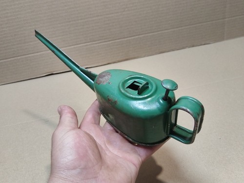 Antique metal small pump oil - small,